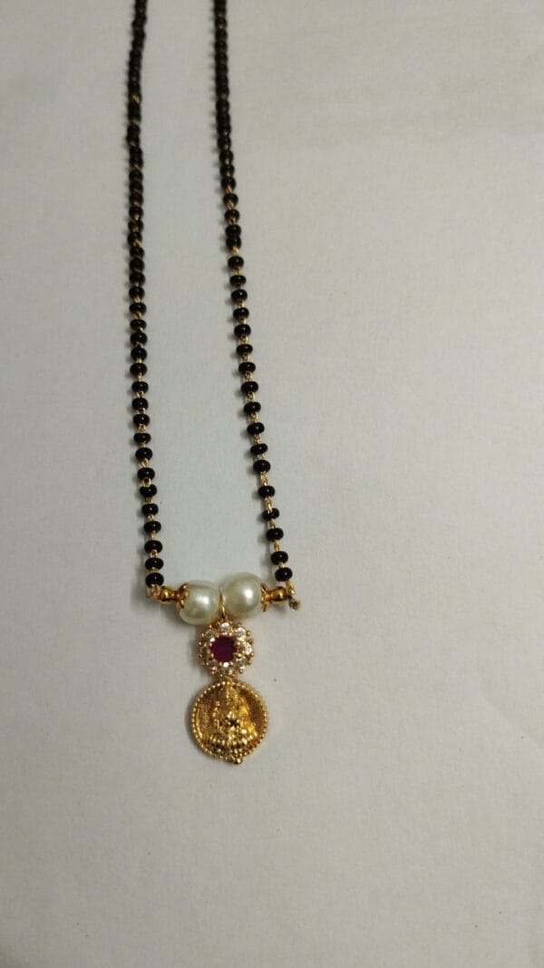 Black beads  Lakshmi Pendent chain with Ruby and Pearl