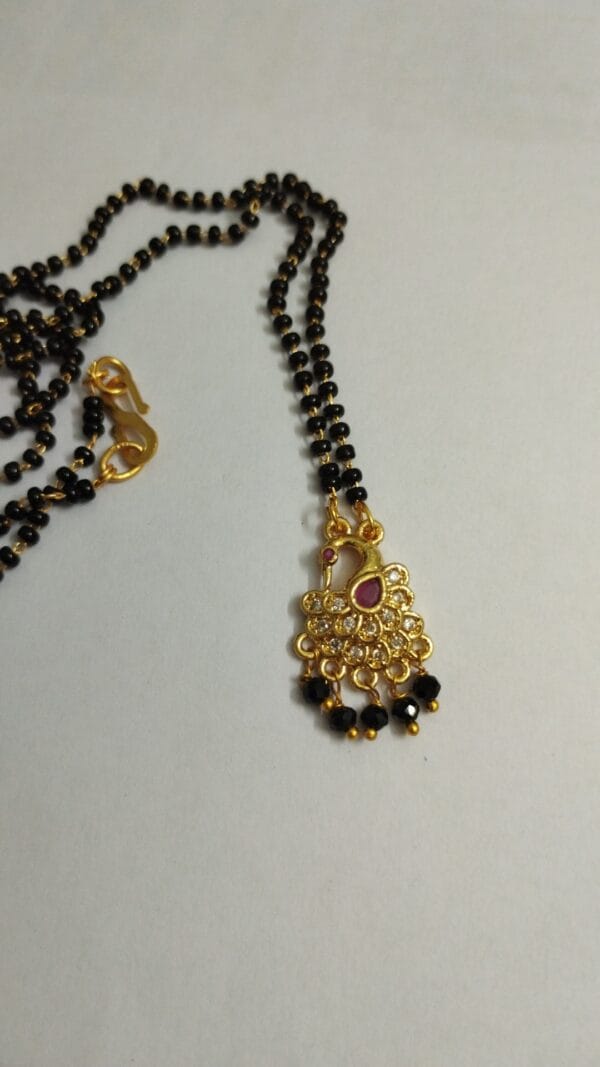 Black Beads chain with Peacock Ruby Pendent