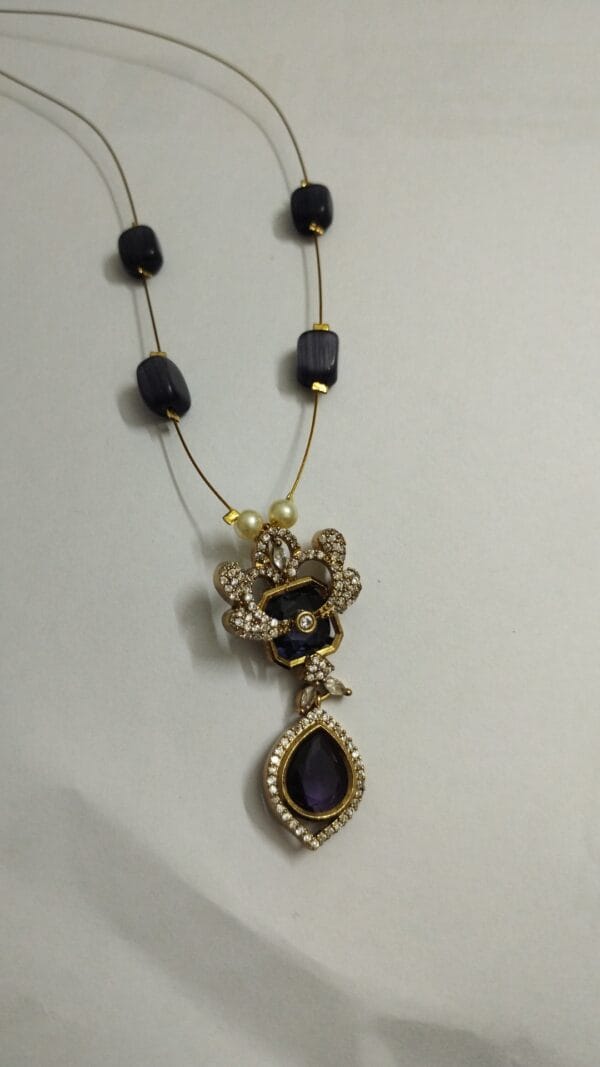 Wire Chain with cross cut purple and CZ embedded pendent